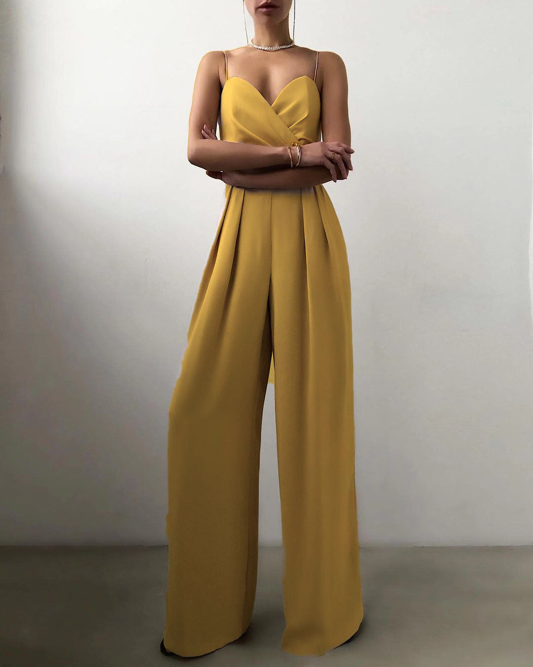 Dam Jumpsuit med Spaghettiremmar och Bred Benstil