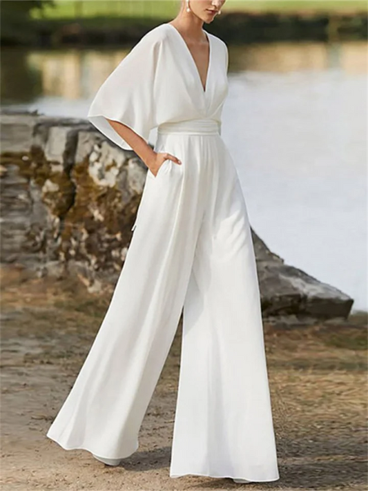 Dam Jumpsuit med V-ringning och Batwing-ärmar