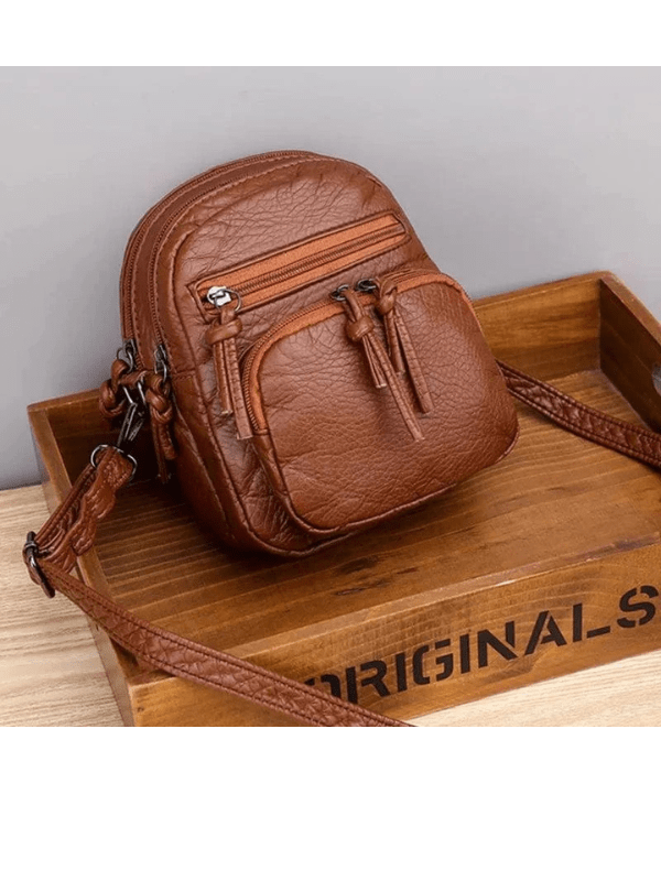 Damväska med justerbar axelrem 1